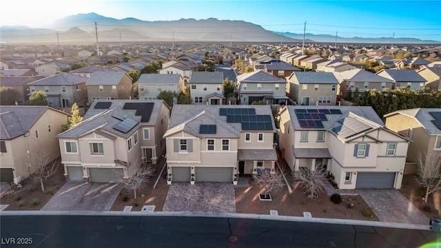 drone / aerial view featuring a mountain view