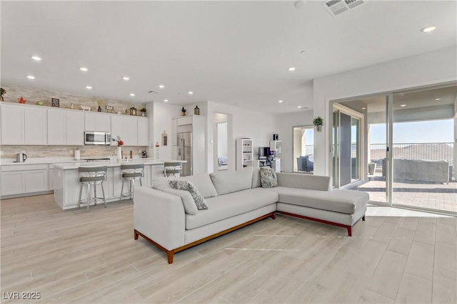 living room with light wood-type flooring