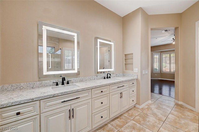 bathroom featuring vanity and tile patterned flooring