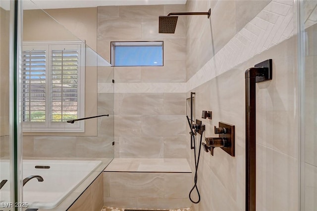 bathroom with a tile shower