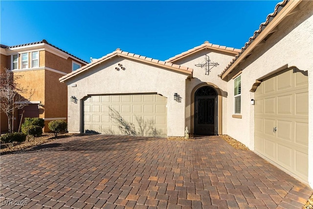 view of front of property featuring a garage