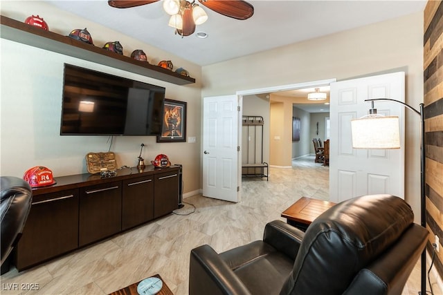 living room with ceiling fan