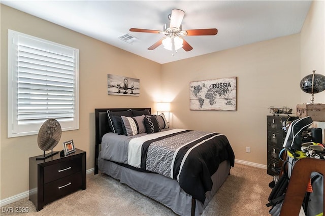 carpeted bedroom with ceiling fan