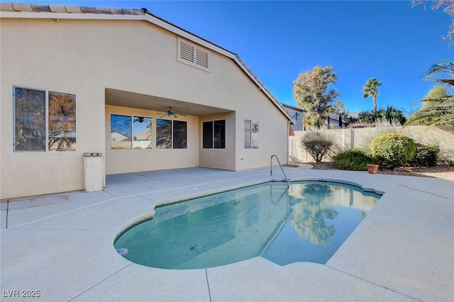 view of pool featuring ceiling fan and a patio area