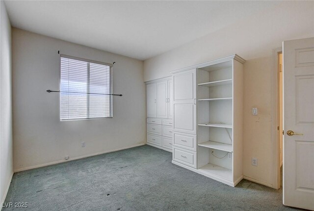 unfurnished bedroom with light colored carpet