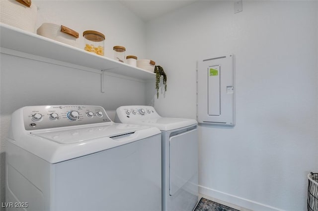 laundry area featuring separate washer and dryer and electric panel