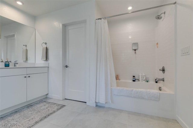 bathroom with vanity, shower / bath combination with curtain, and tile patterned floors