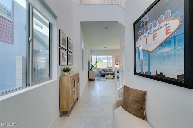 hallway with light tile patterned floors