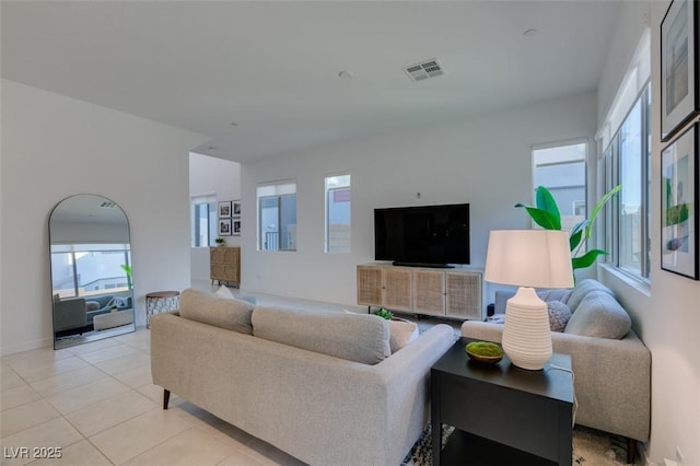 living room featuring light tile patterned flooring