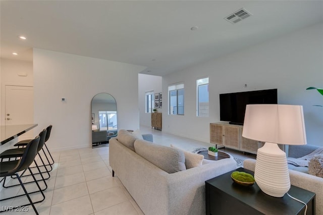 living room with light tile patterned floors