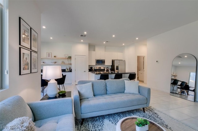 living room featuring light tile patterned floors