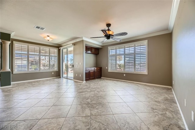 tiled empty room with ceiling fan and crown molding