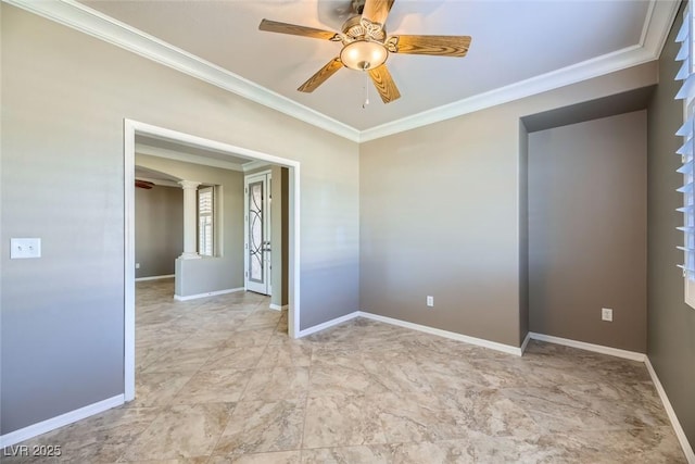 empty room with crown molding and ceiling fan