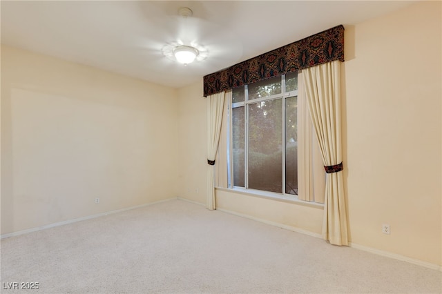 spare room featuring carpet floors