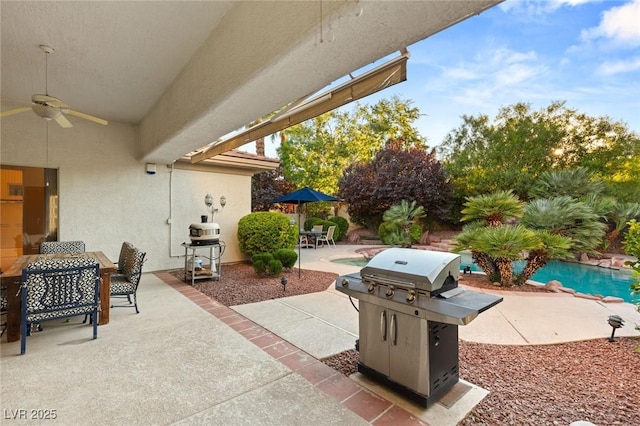 view of patio / terrace with ceiling fan and grilling area