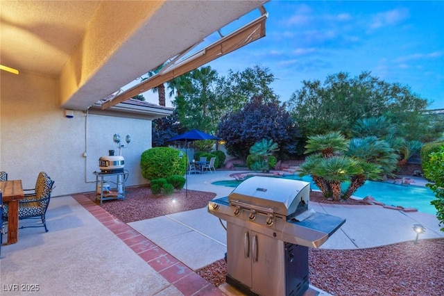 view of patio / terrace with a grill