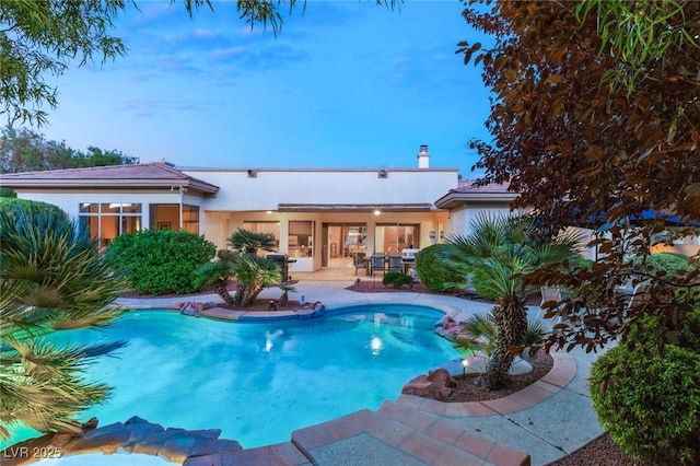 view of pool featuring a patio area