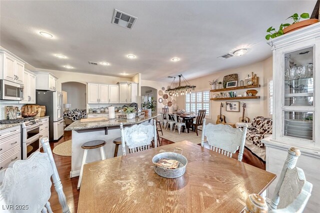 dining room with light wood-type flooring