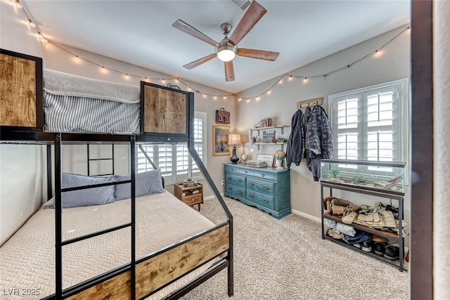 carpeted bedroom with vaulted ceiling