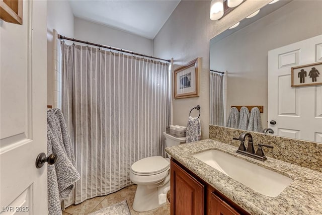 bathroom with vanity, walk in shower, and toilet