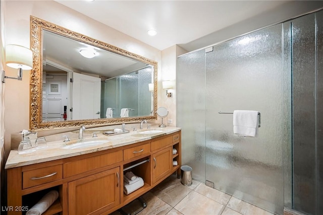 bathroom with vanity, a shower with shower door, and tile patterned flooring