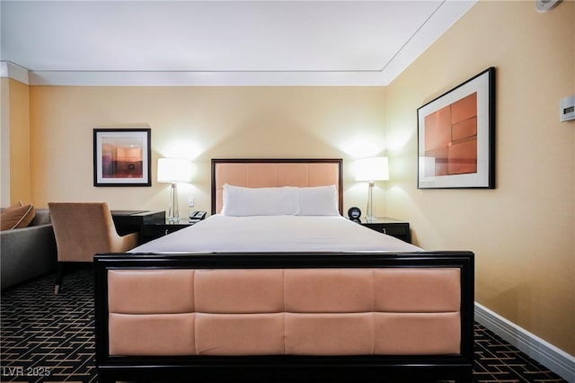 bedroom featuring crown molding