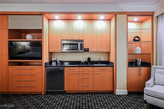 kitchen with sink and fridge