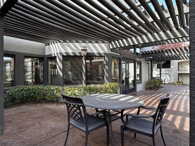 view of patio featuring a pergola