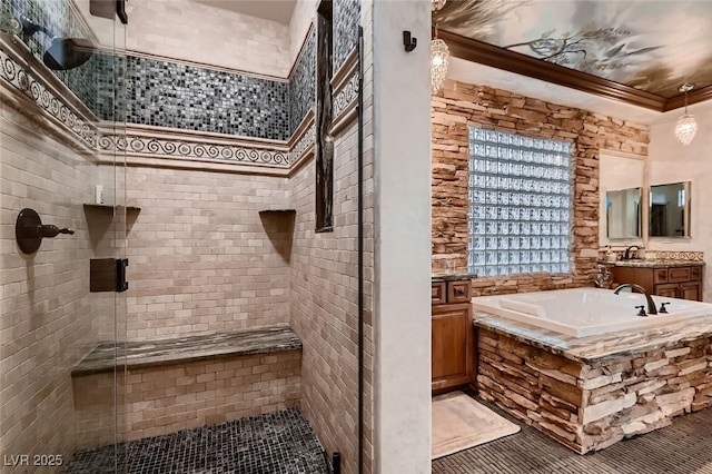 bathroom featuring vanity and shower with separate bathtub