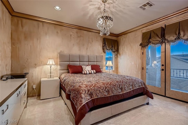 bedroom featuring access to exterior, crown molding, light carpet, an inviting chandelier, and french doors