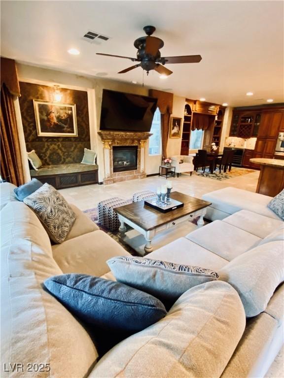 living room featuring ceiling fan