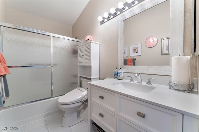 full bathroom with vanity, toilet, bath / shower combo with glass door, and tile patterned flooring