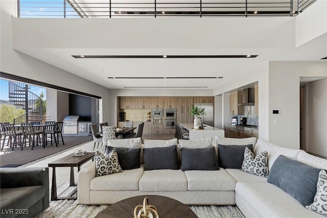 living room with a high ceiling