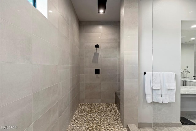 bathroom with recessed lighting and walk in shower