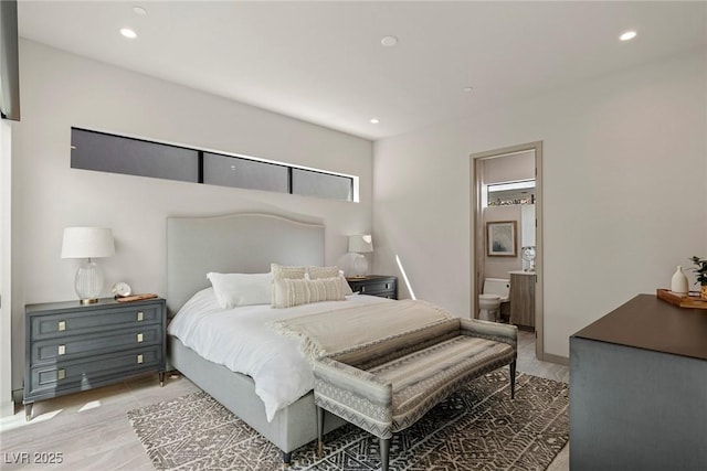 bedroom with recessed lighting and ensuite bathroom