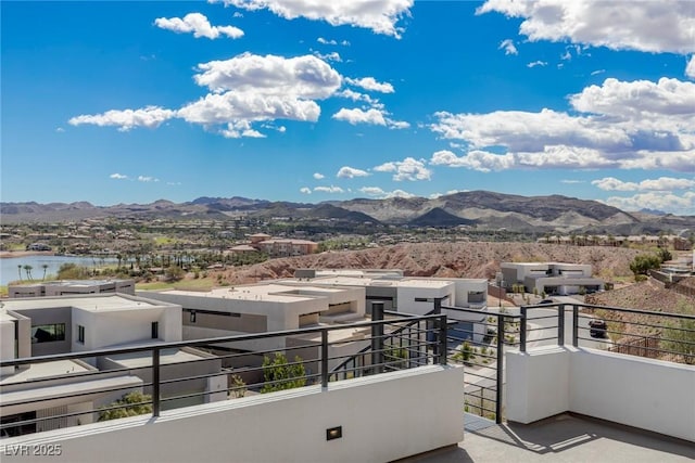 balcony featuring a mountain view