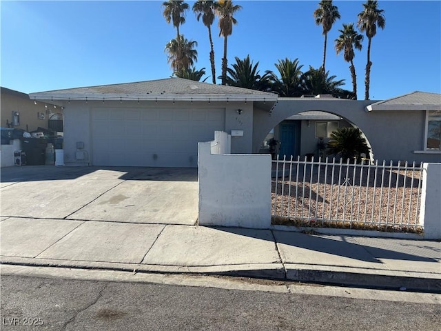 single story home featuring a garage