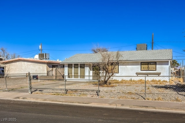 ranch-style house with central AC