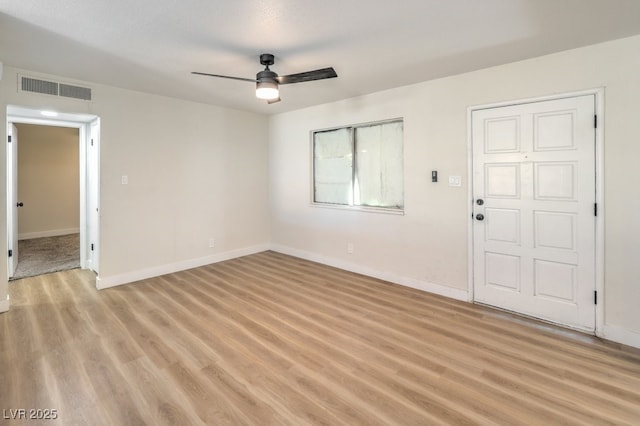 unfurnished room featuring ceiling fan and light hardwood / wood-style flooring