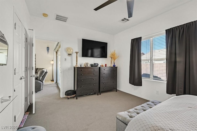 carpeted bedroom featuring ceiling fan