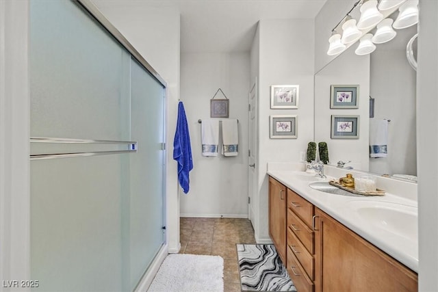 bathroom with vanity, tile patterned floors, a chandelier, and walk in shower