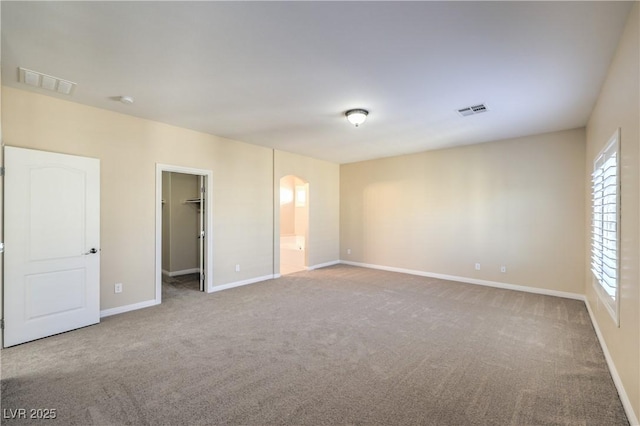 view of carpeted spare room