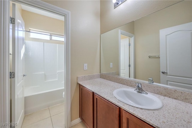 full bathroom with tub / shower combination, tile patterned floors, vanity, and toilet