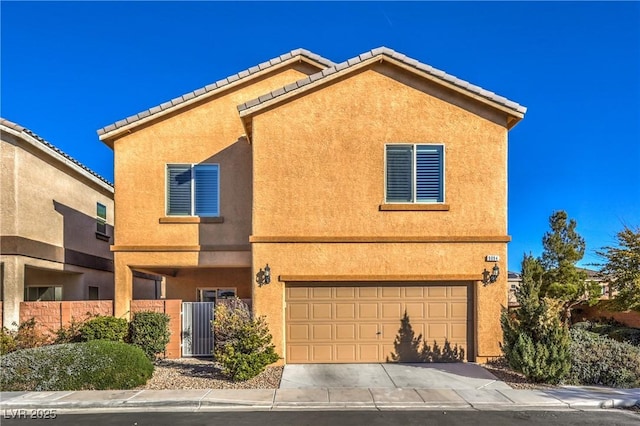 view of front of property with a garage