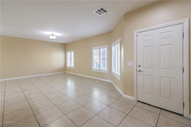 entrance foyer featuring light tile patterned flooring