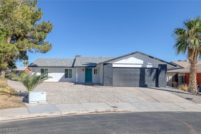 single story home featuring a garage