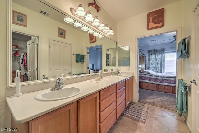 bathroom featuring tile patterned floors and vanity