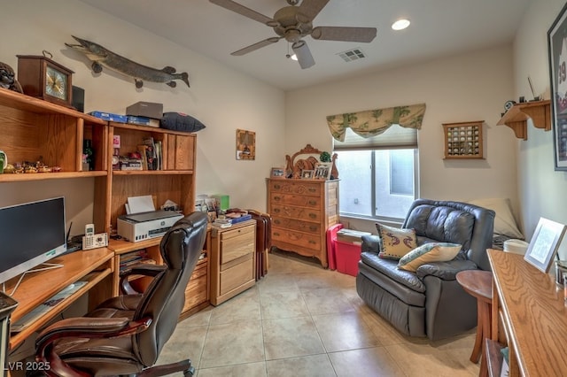 office with ceiling fan and light tile patterned flooring