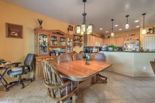 dining room with light tile patterned flooring