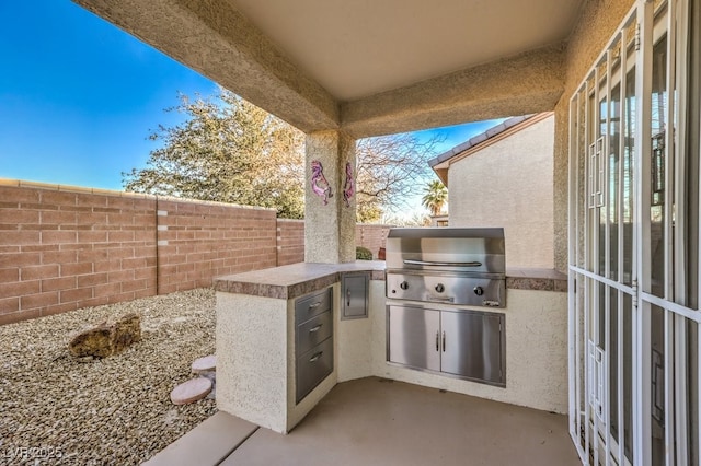 view of patio featuring area for grilling